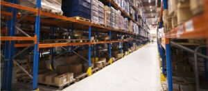 interior large distribution warehouse with shelves stacked with palettes goods ready market