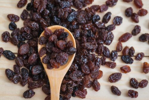 raisins on a wooden spoon Petrochemical